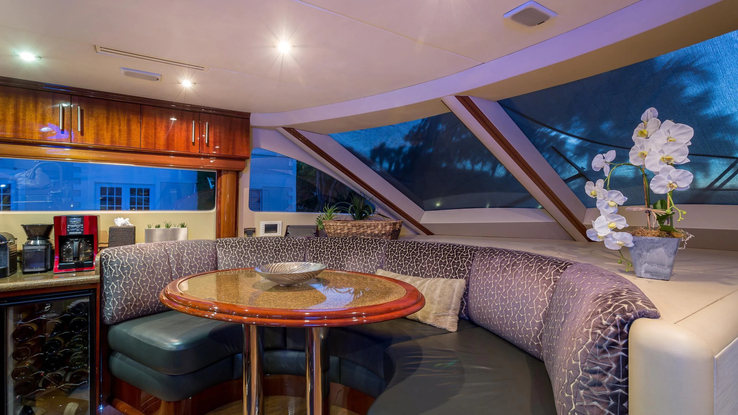 a living room with a large window aboard ALWAYS BAREFOOT Yacht for Sale