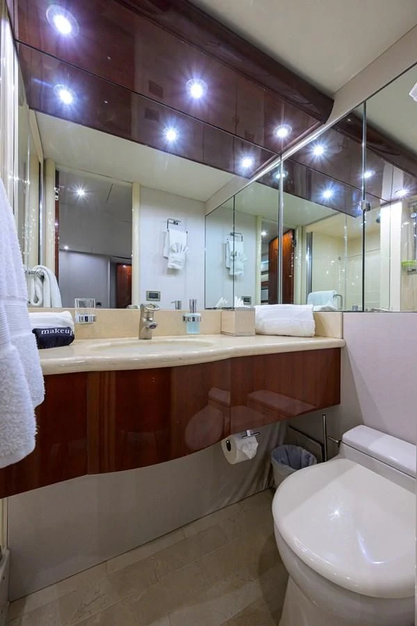 a bathroom with a large mirror aboard ALWAYS BAREFOOT Yacht for Sale