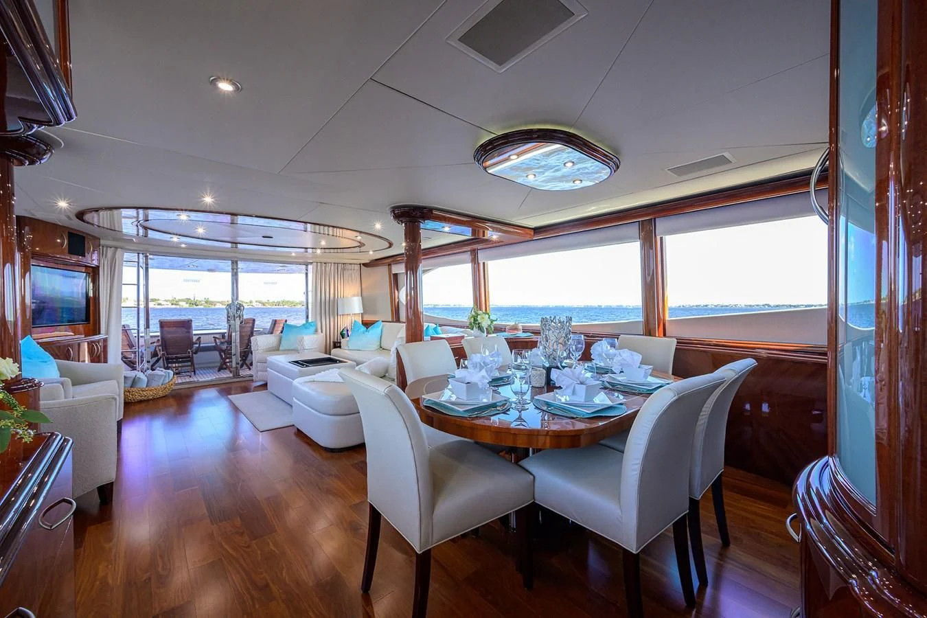a large dining room with a large window aboard ALWAYS BAREFOOT Yacht for Sale
