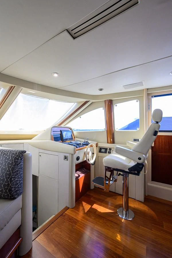 a room with a desk and a chair aboard ALWAYS BAREFOOT Yacht for Sale