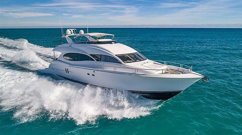 a white yacht on the water aboard ALWAYS BAREFOOT Yacht for Sale