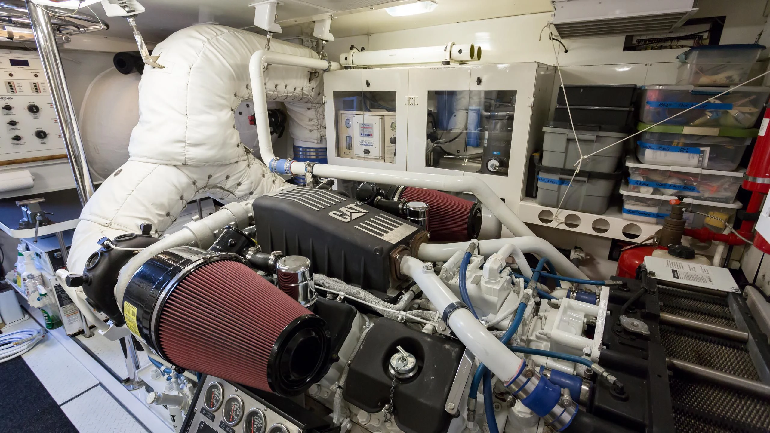 a person in a white coat working in a factory aboard ALWAYS BAREFOOT Yacht for Sale