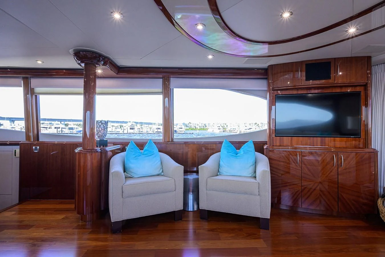 a living room with a large television aboard ALWAYS BAREFOOT Yacht for Sale