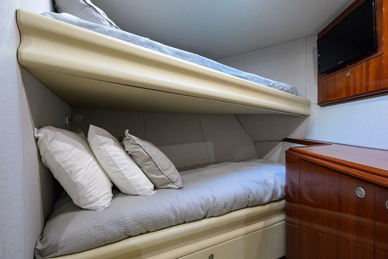 a bed with white sheets aboard ALWAYS BAREFOOT Yacht for Sale
