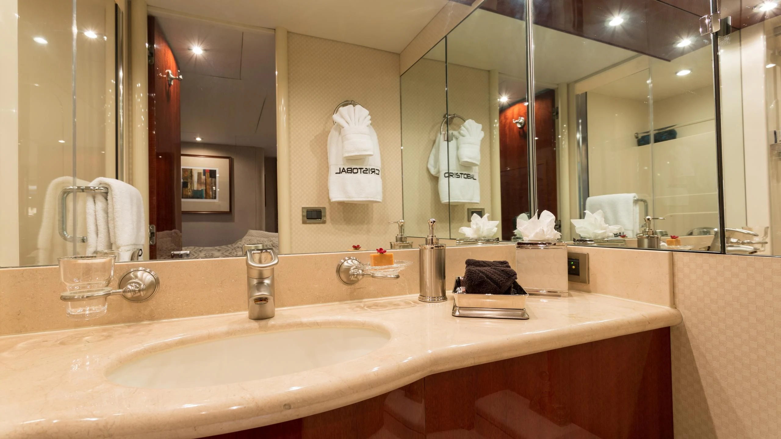 a bathroom with a large mirror aboard ALWAYS BAREFOOT Yacht for Sale
