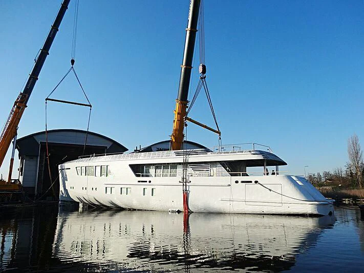a large white boat in a body of water aboard CALLISTO Yacht for Sale
