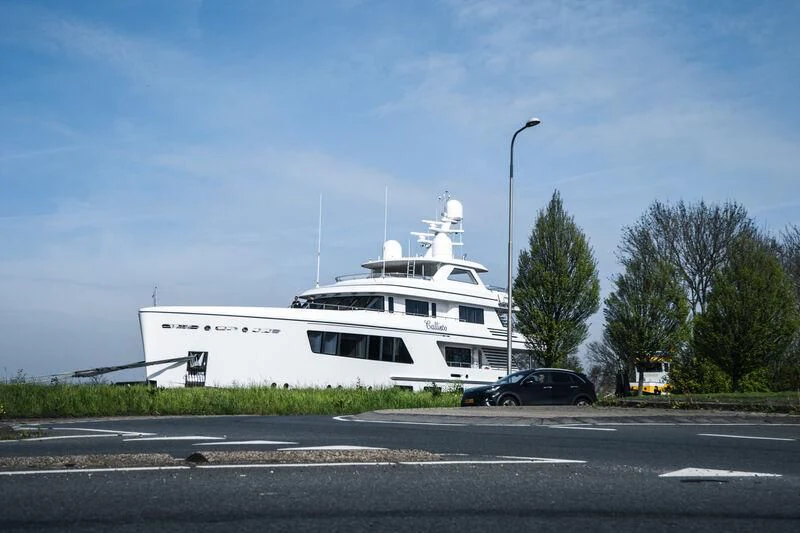 a white boat on a road aboard CALLISTO Yacht for Sale
