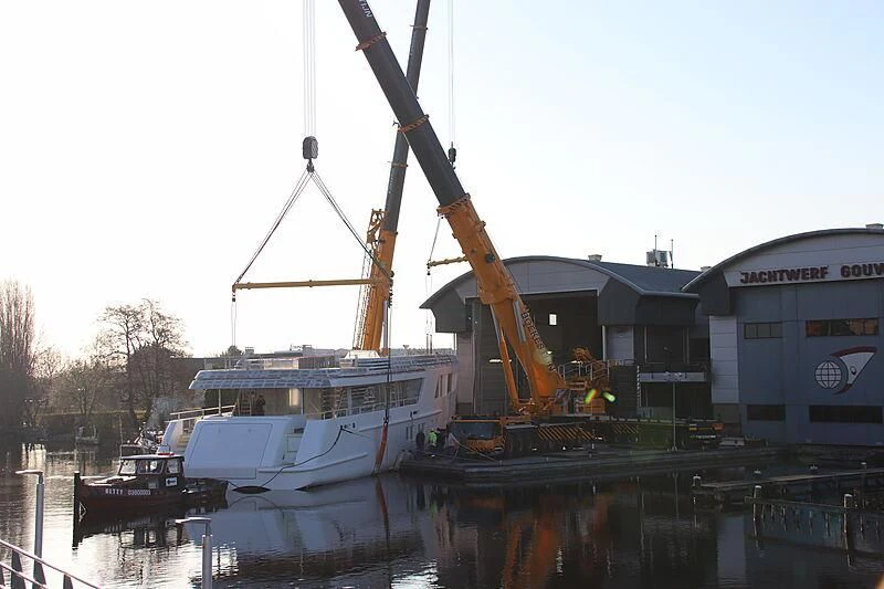 a crane lifting a boat aboard CALLISTO Yacht for Sale