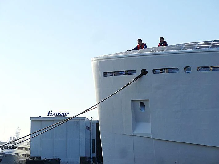 a couple of men on a boat aboard CALLISTO Yacht for Sale