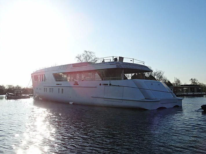 a large white boat on the water aboard CALLISTO Yacht for Sale