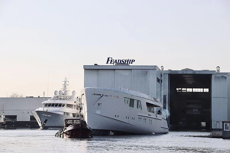 a couple of boats are parked in the water aboard CALLISTO Yacht for Sale