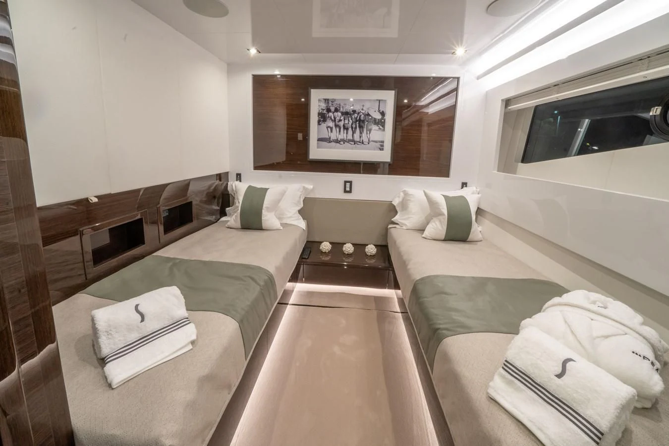a room with a bed and a couch aboard OLIVIA RB Yacht for Sale