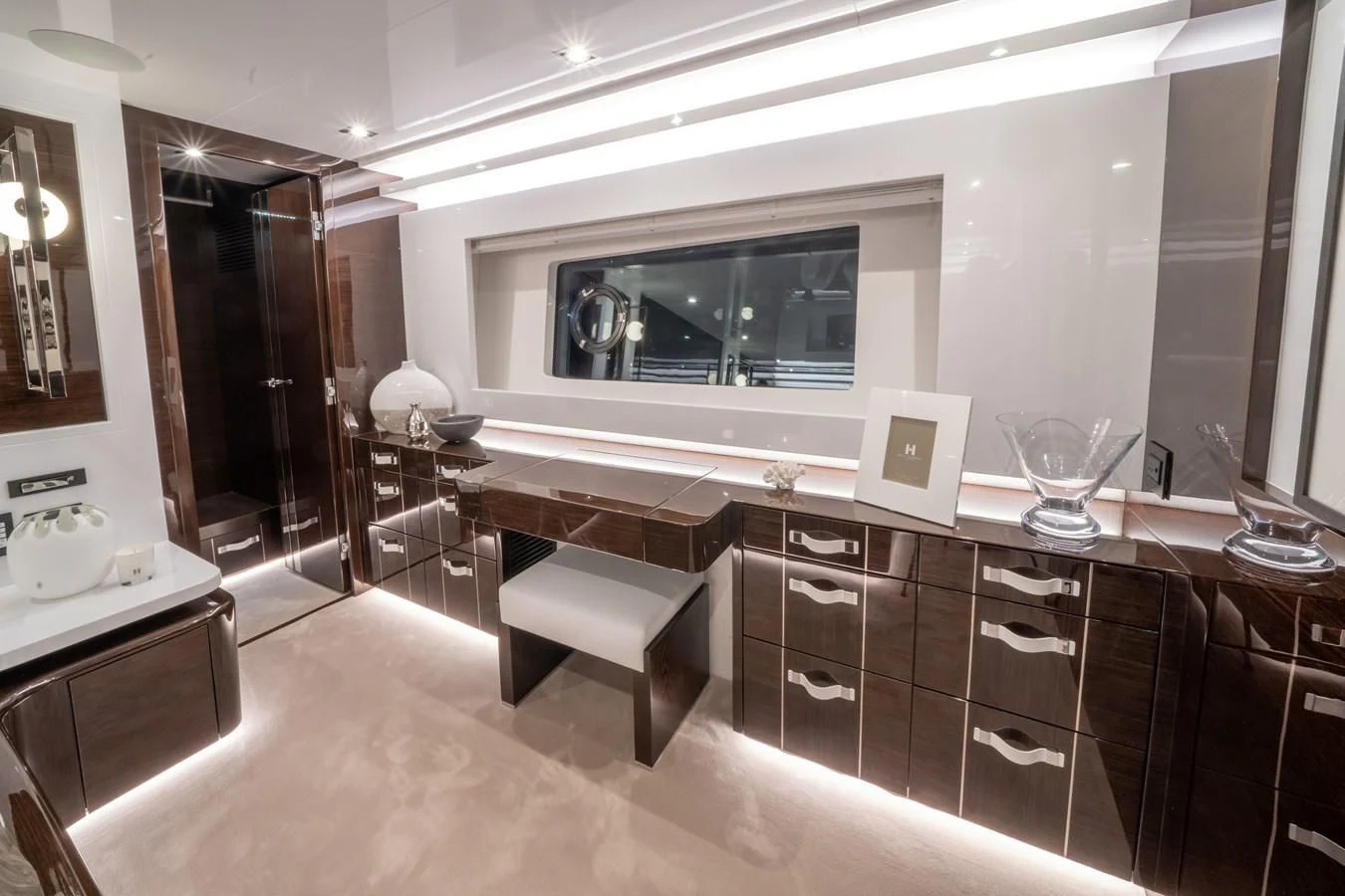 a room with a table chairs and a tv aboard OLIVIA RB Yacht for Sale