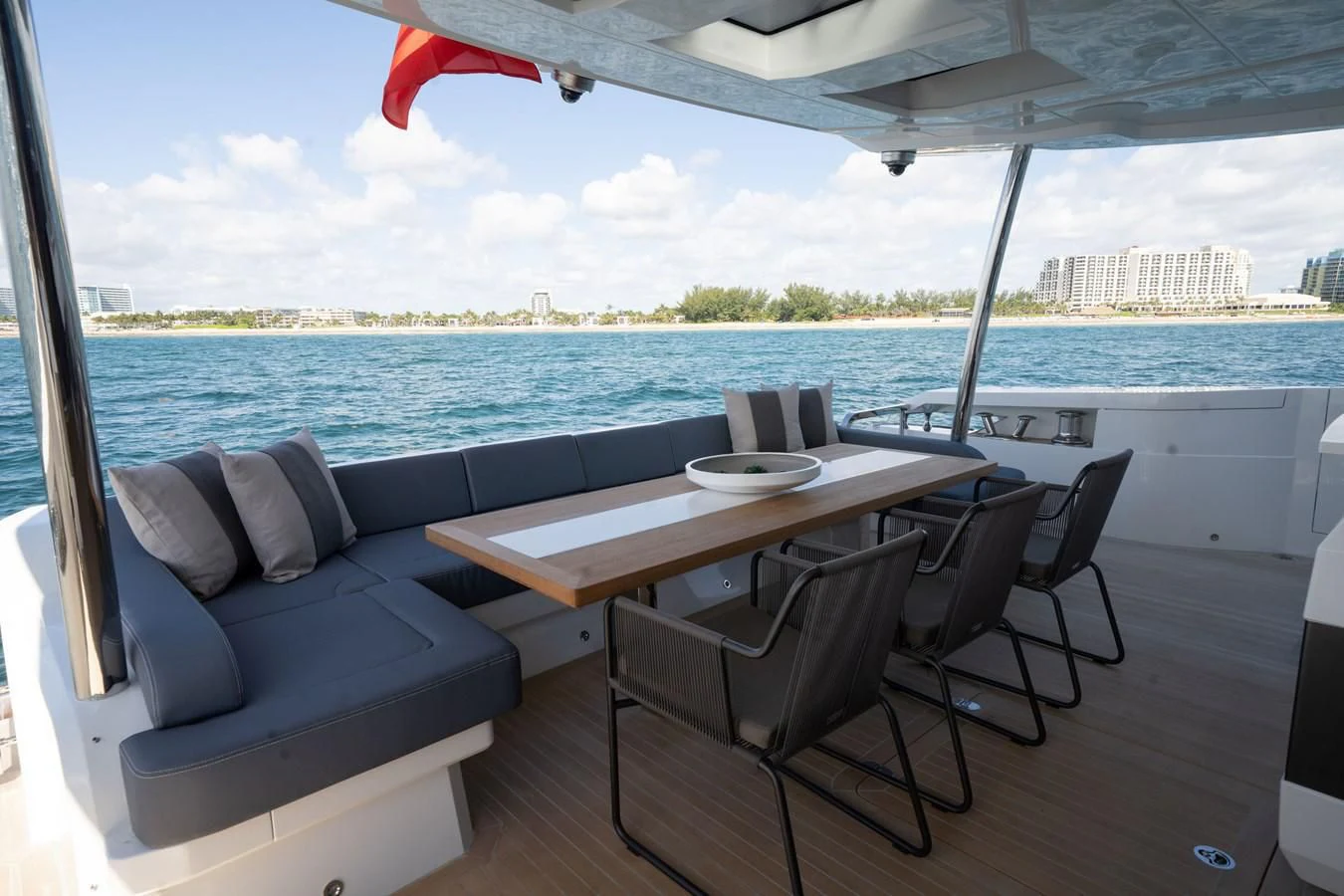a table and chairs on a boat aboard OLIVIA RB Yacht for Sale