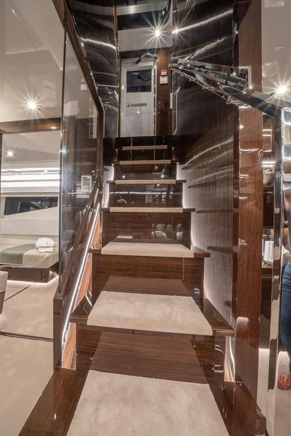 a large metal staircase aboard OLIVIA RB Yacht for Sale