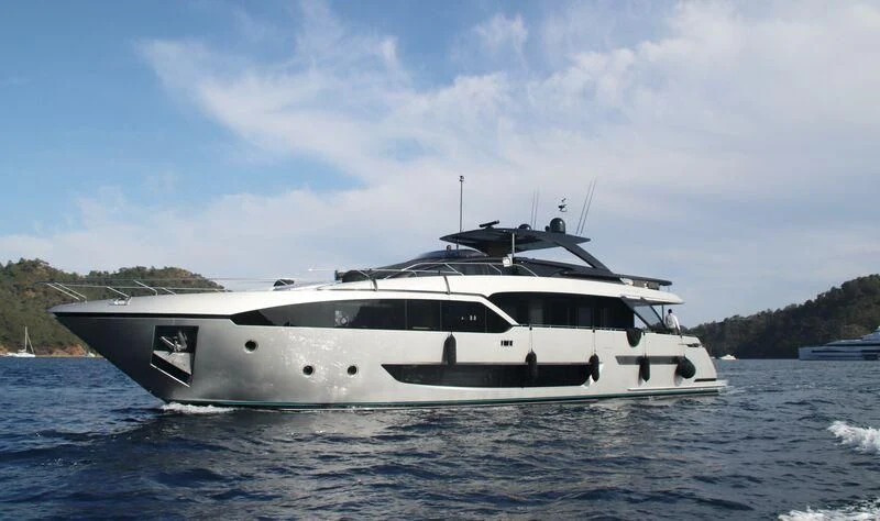 a white yacht on the water aboard MY WAY V Yacht for Sale