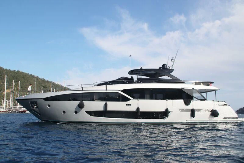 a white yacht in the water aboard MY WAY V Yacht for Sale