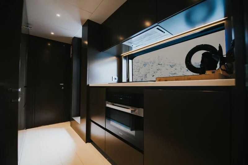 a room with a large display aboard MY WAY V Yacht for Sale