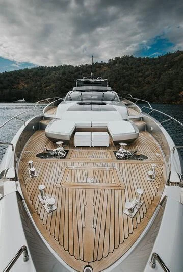 a deck with a boat on it aboard MY WAY V Yacht for Sale