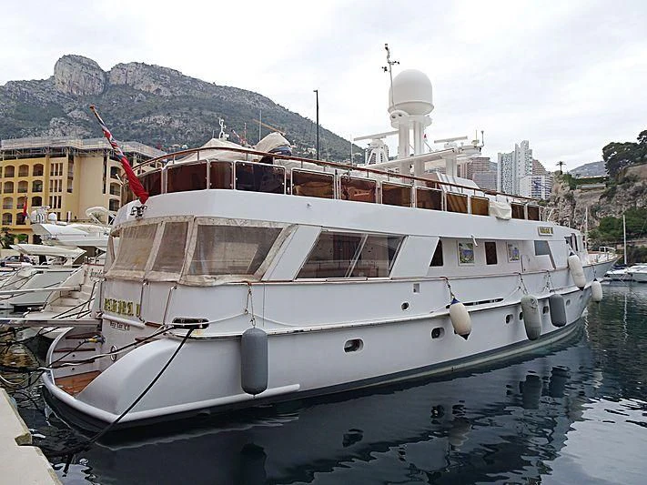 a boat docked in a harbor aboard BAHIRA II Yacht for Sale