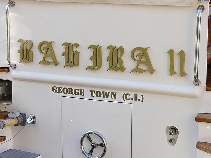 a white wall with a sign on it aboard BAHIRA II Yacht for Sale