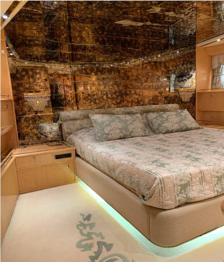 a bed in a room aboard BAHIRA II Yacht for Sale