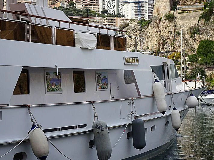 a boat docked in a harbor aboard BAHIRA II Yacht for Sale