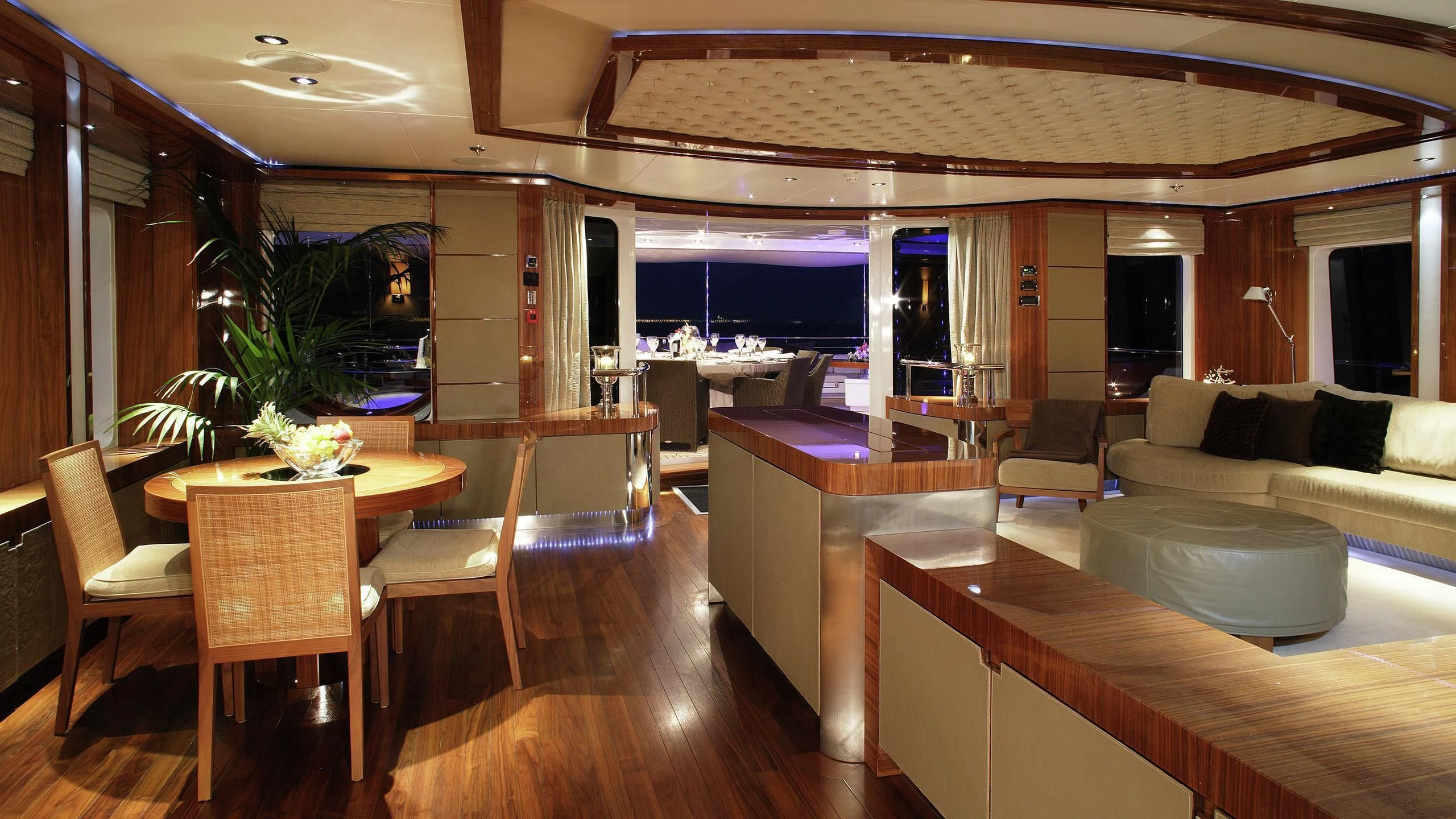 a room with a table and chairs aboard TALISMAN MAITON Yacht for Charter