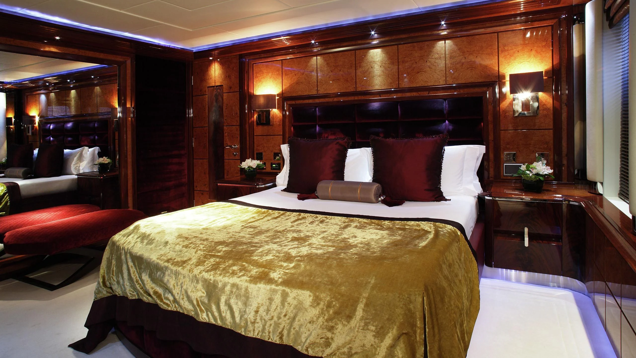 a bed with pillows and pillows aboard TALISMAN MAITON Yacht for Charter