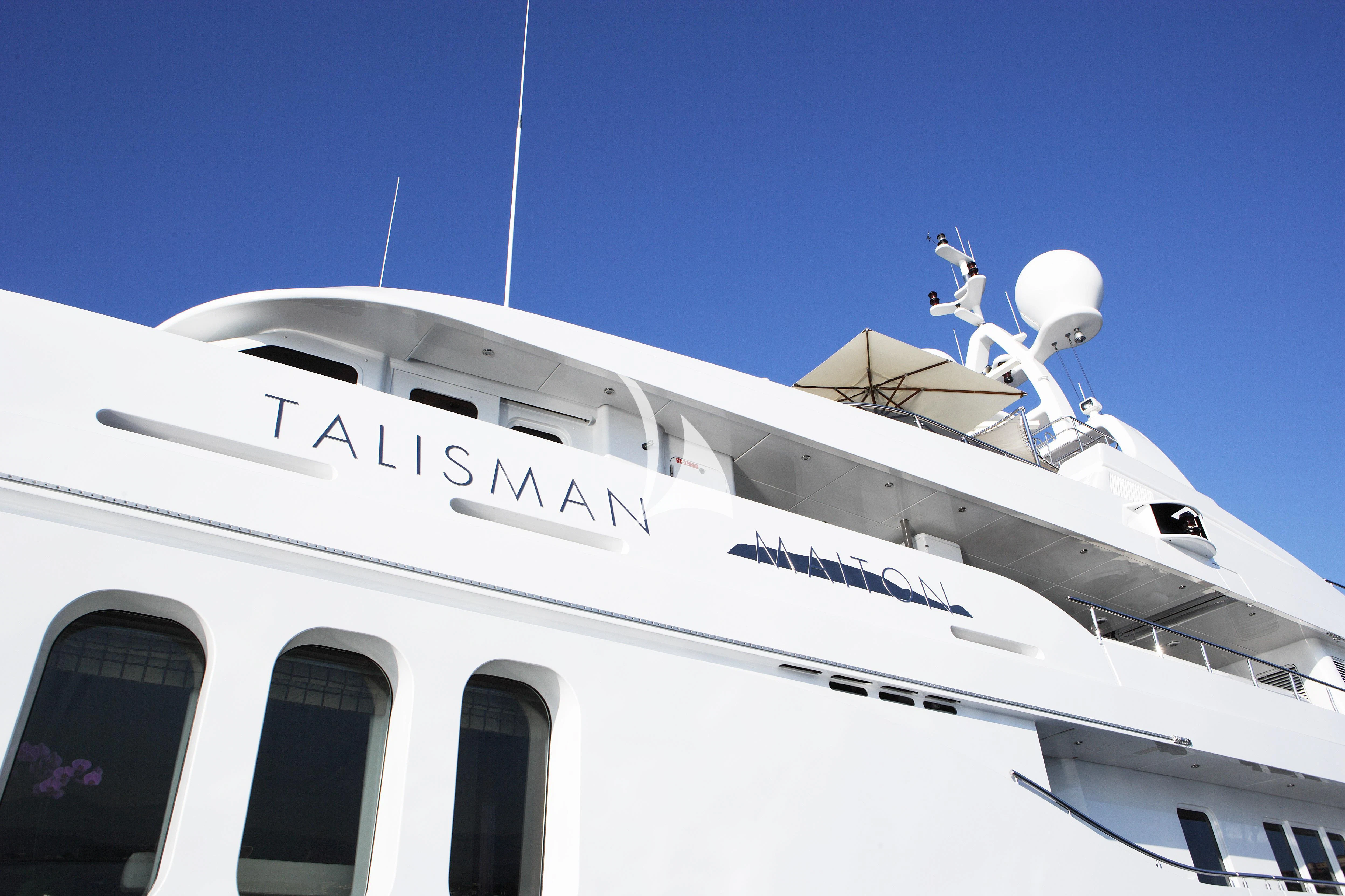 a white yacht with a satellite dish on top aboard TALISMAN MAITON Yacht for Charter