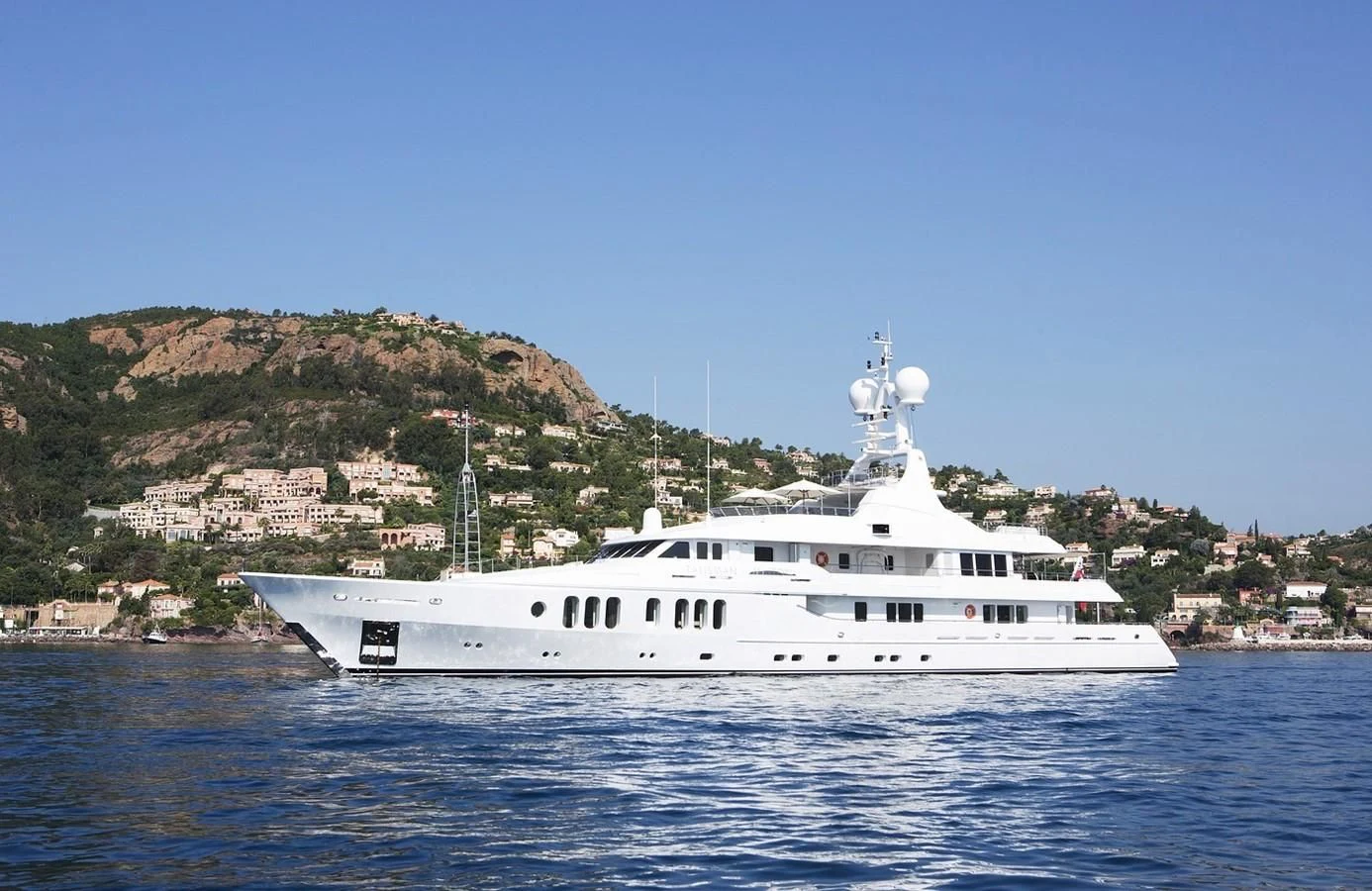 a large white boat in the water aboard TALISMAN MAITON Yacht for Charter