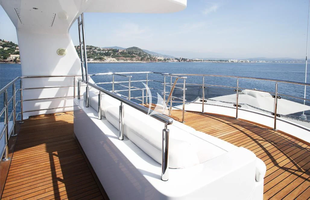 a deck overlooking a body of water aboard TALISMAN MAITON Yacht for Charter
