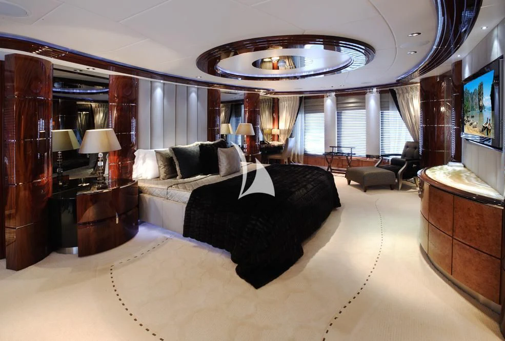 a large living room with a large mirror aboard TALISMAN MAITON Yacht for Charter