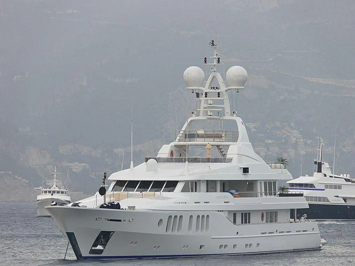 a large white boat in the water aboard TALISMAN MAITON Yacht for Charter