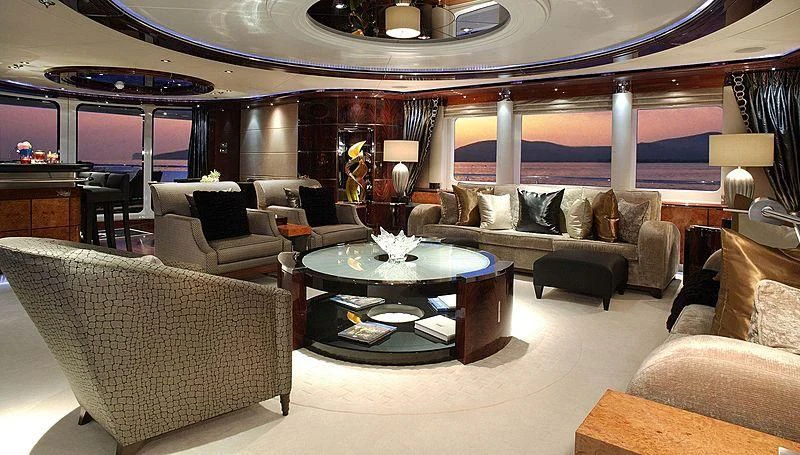 a large living room with a large window aboard TALISMAN MAITON Yacht for Charter
