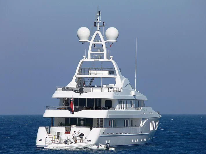 a white boat in the water aboard TALISMAN MAITON Yacht for Charter