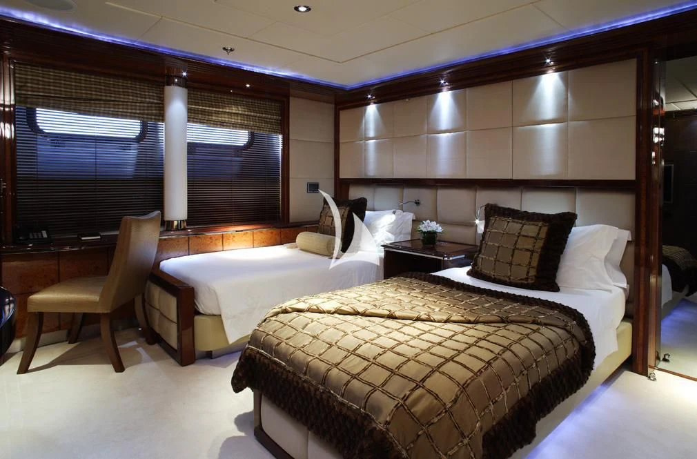 a room with two beds aboard TALISMAN MAITON Yacht for Charter