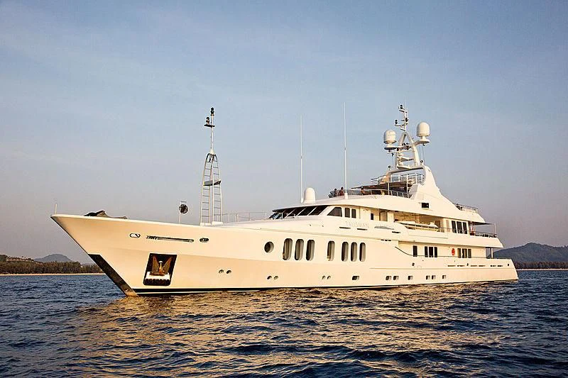a large white ship in the water aboard TALISMAN MAITON Yacht for Charter
