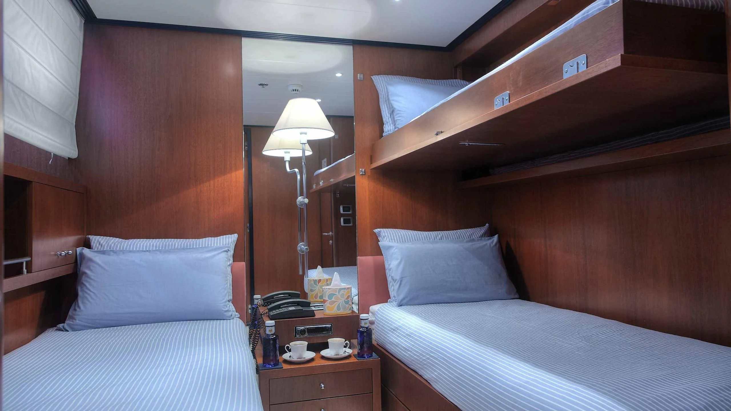 a room with two beds aboard TALISMAN MAITON Yacht for Charter