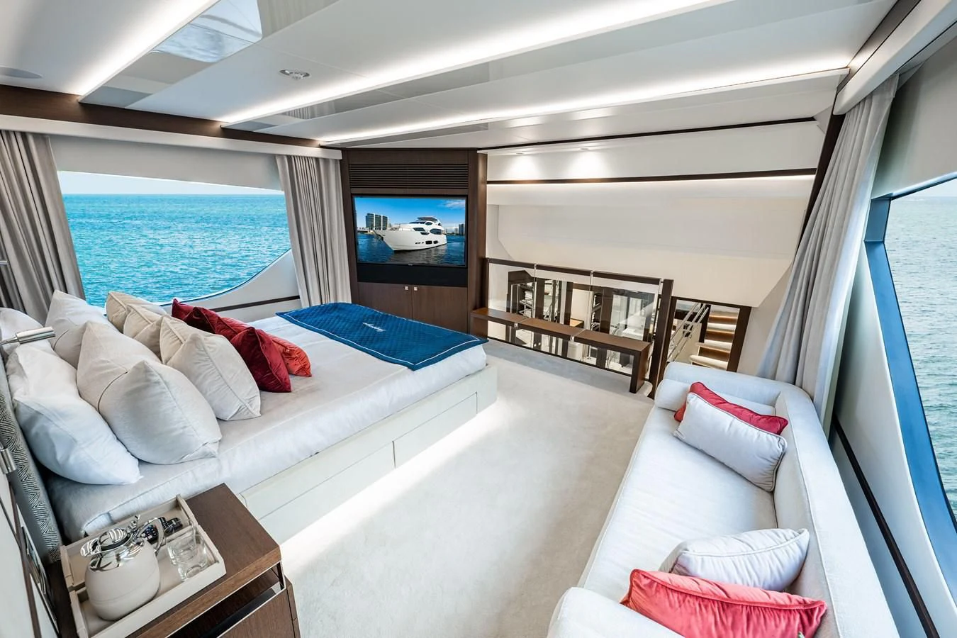 a room with a bed and a tv aboard ROMANI Yacht for Sale