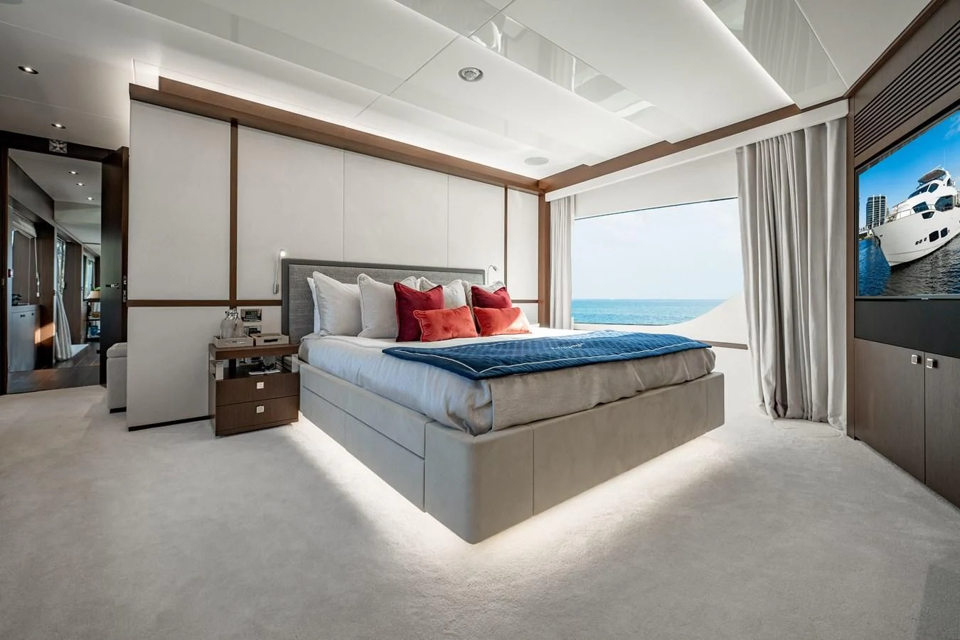 a bed in a room aboard ROMANI Yacht for Sale