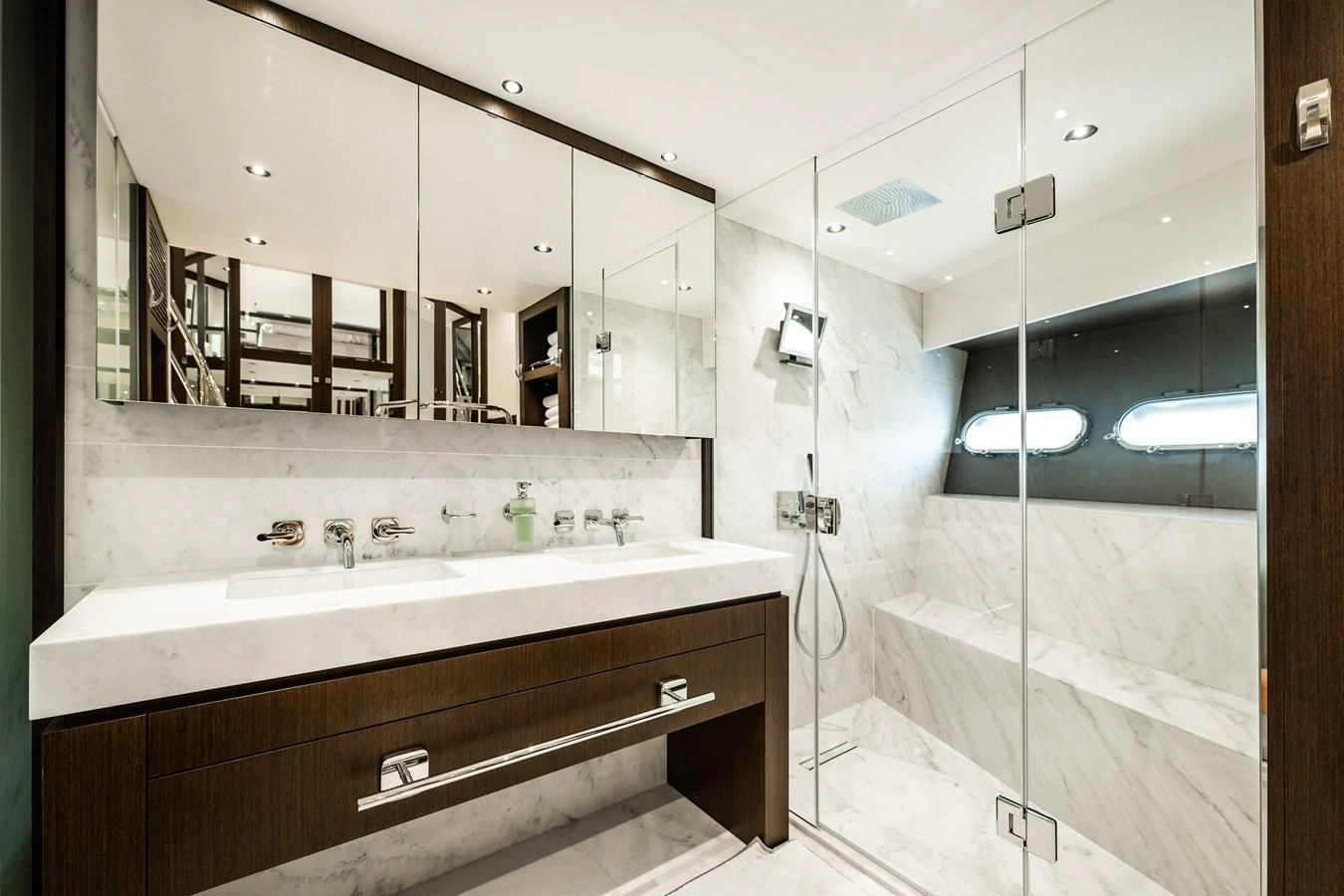 a bathroom with a large mirror aboard ROMANI Yacht for Sale
