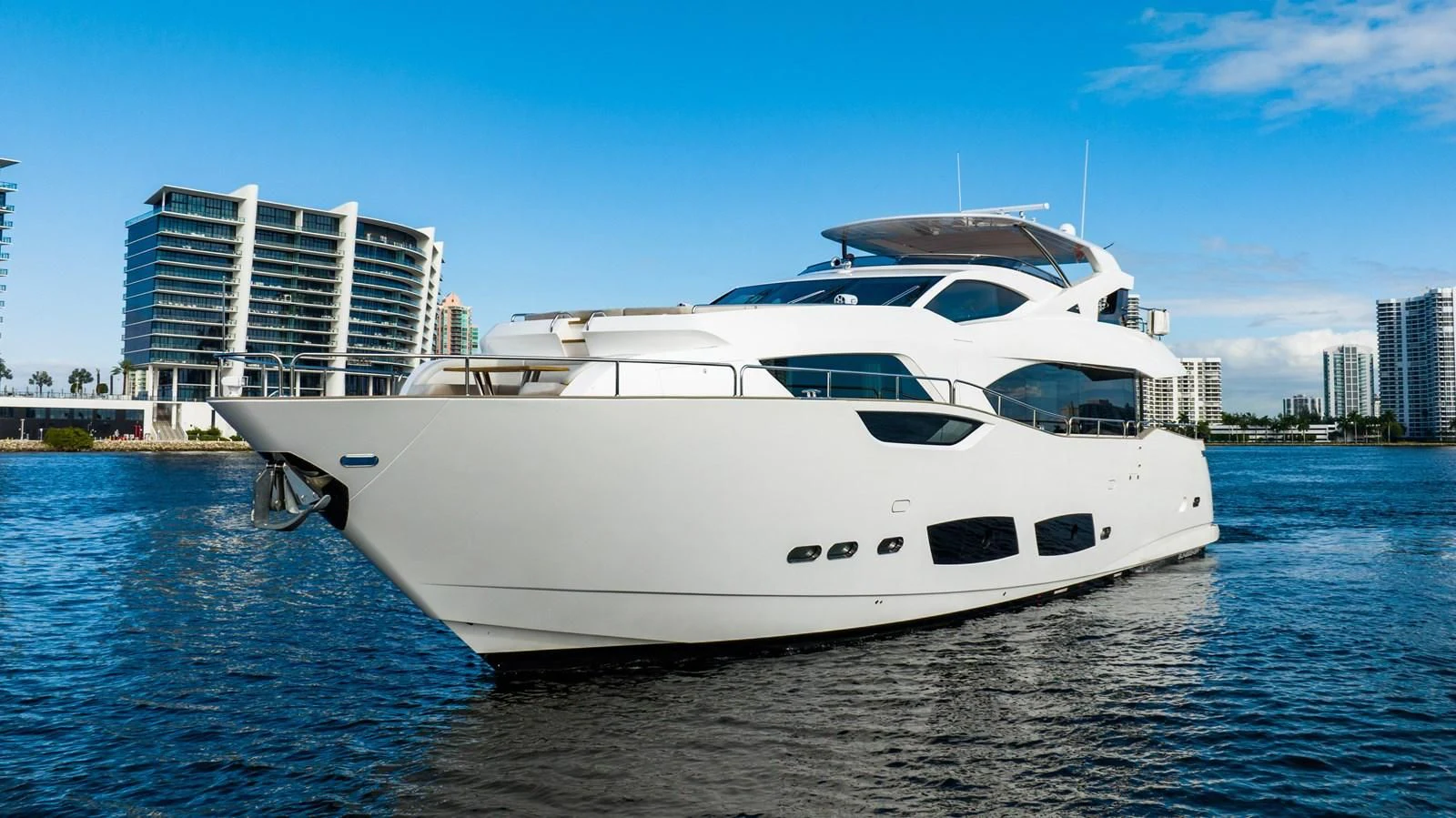 a white yacht on the water aboard ROMANI Yacht for Sale