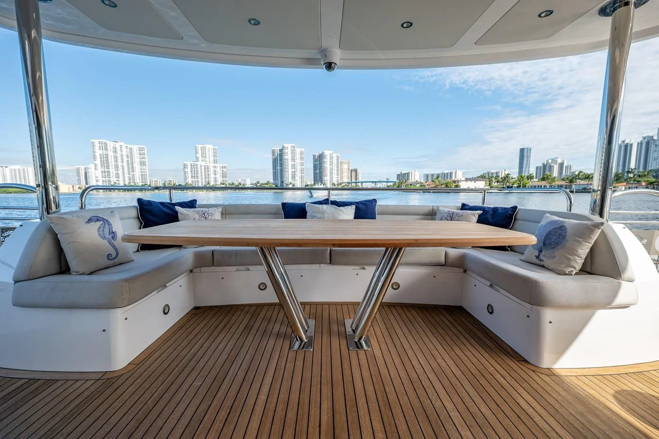 a room with a view of a city and a large body of water aboard ROMANI Yacht for Sale