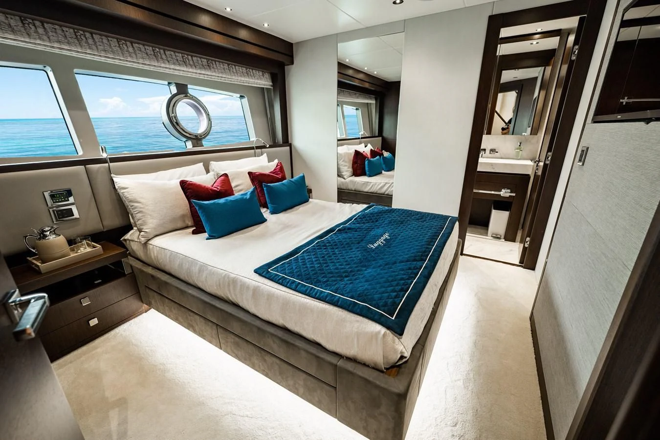 a bed in a room aboard ROMANI Yacht for Sale