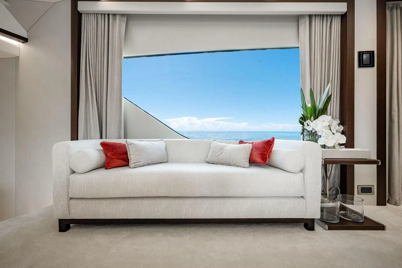 a couch in a room aboard ROMANI Yacht for Sale
