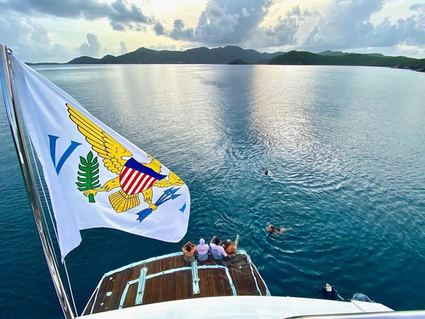 a group of people on a boat aboard ELITE Yacht for Sale