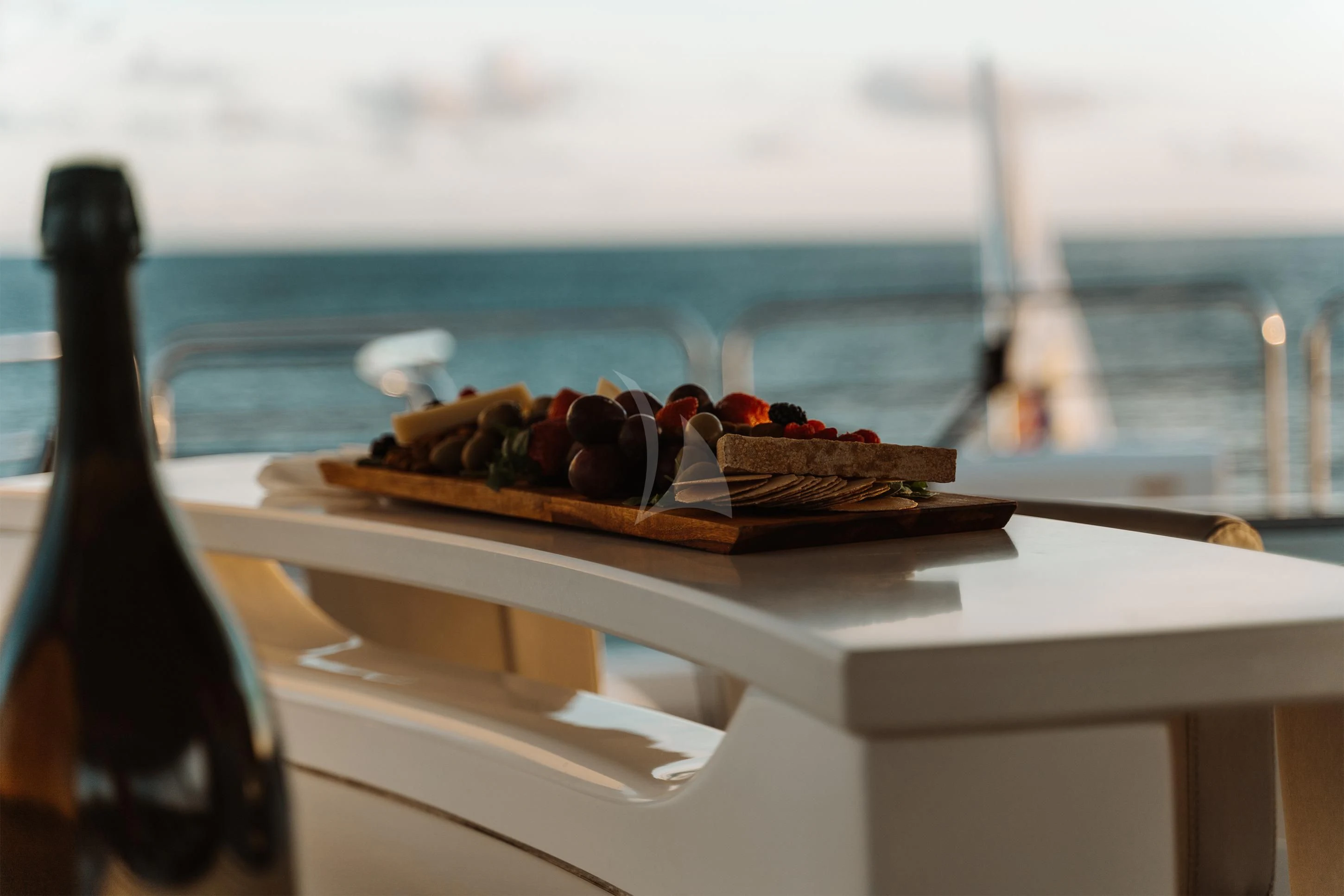 a plate of dessert on a table aboard ELITE Yacht for Sale