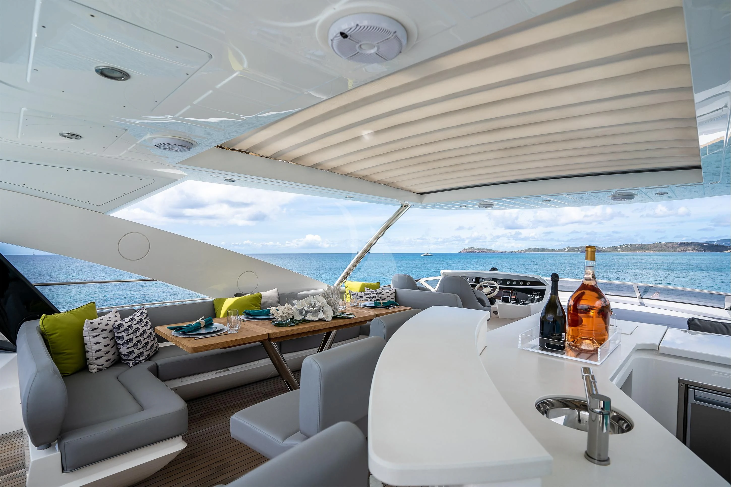a boat with a table and chairs aboard ELITE Yacht for Sale