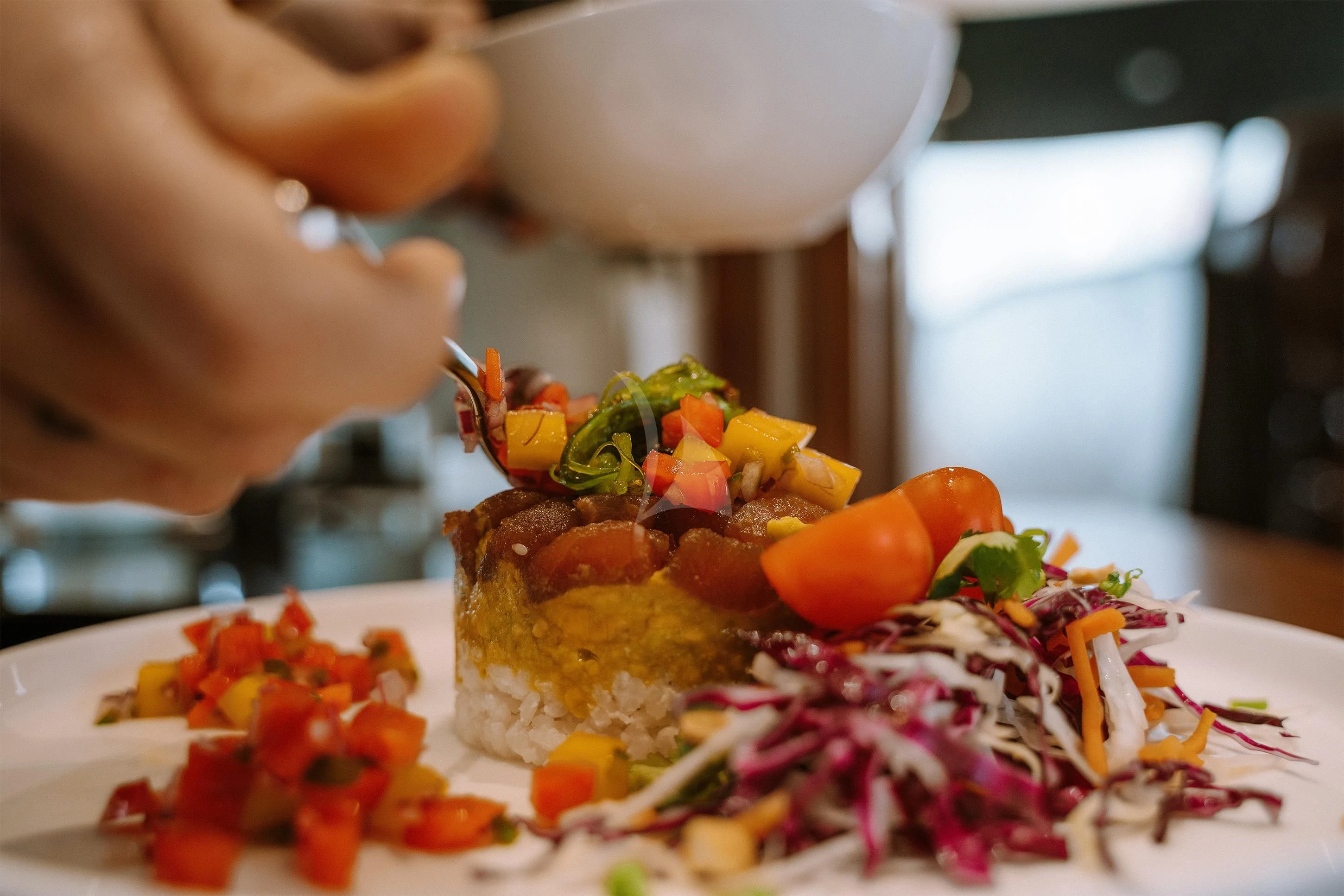 a person eating a plate of food aboard ELITE Yacht for Sale